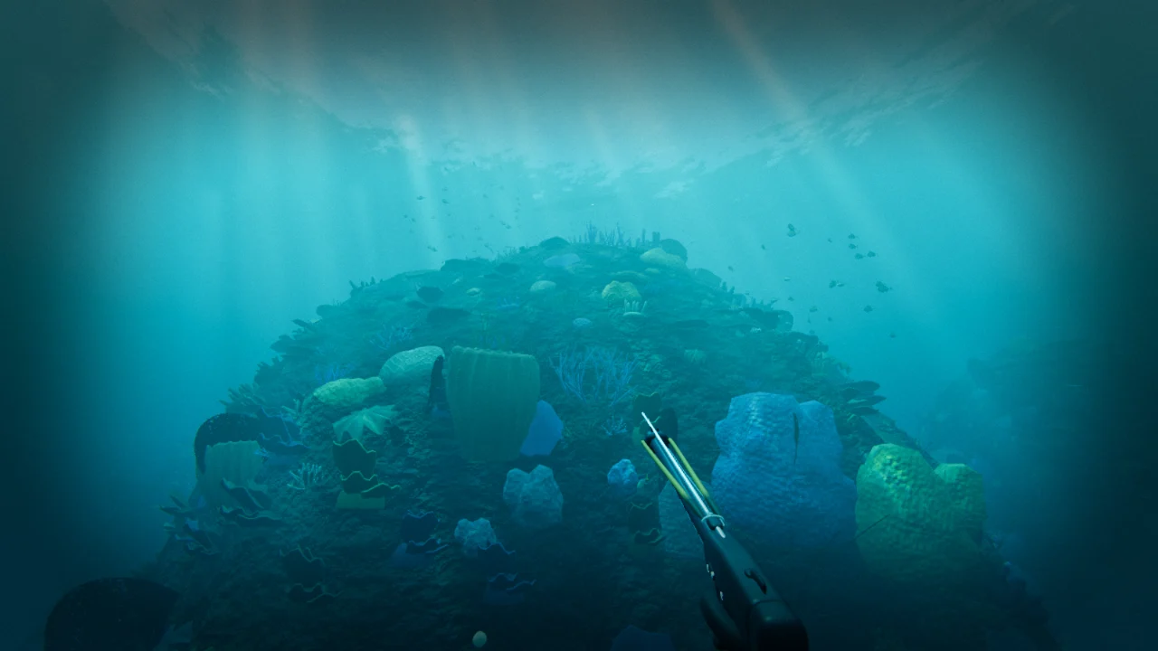 A coral bommie covered in sponges and hard corals under shafts of sunlight